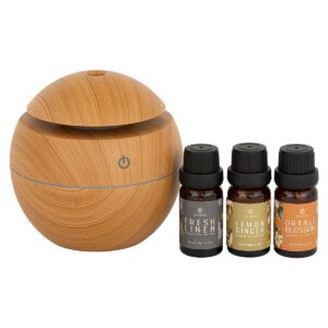 Kit de difusor portátil inalámbrico con tres aceites esenciales para relajación y bienestar.